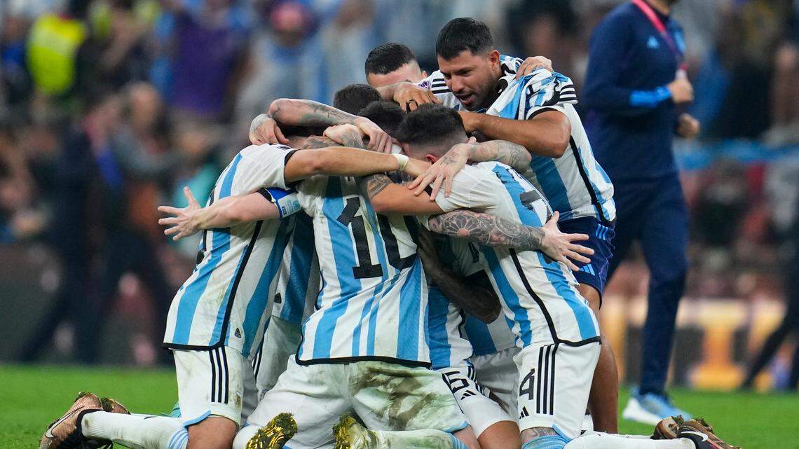 Players of Argentina celebrate defeating France in the World Cup final soccer match between Argentina and France at the Lusail Stadium in Lusail, Qatar, on Sunday.