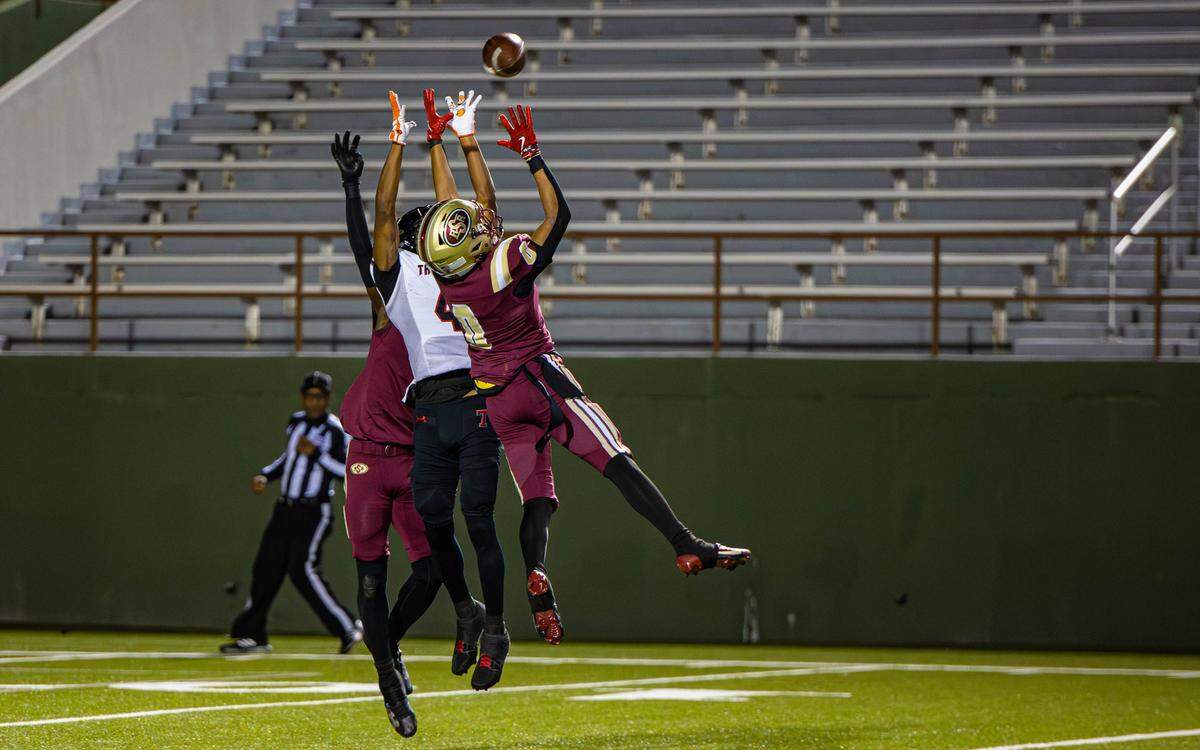 Saginaw’s Aidan Collier (0) helps break up a pass intended for Amarillo Tascosa wide receiver T.J. Tillman (4) in a Class 5A Division 1 area-round game on Friday, Nov. 22, 2024 at Memorial Stadium in Wichita Falls, Texas. Tascosa defeated Saginaw 35-13.
