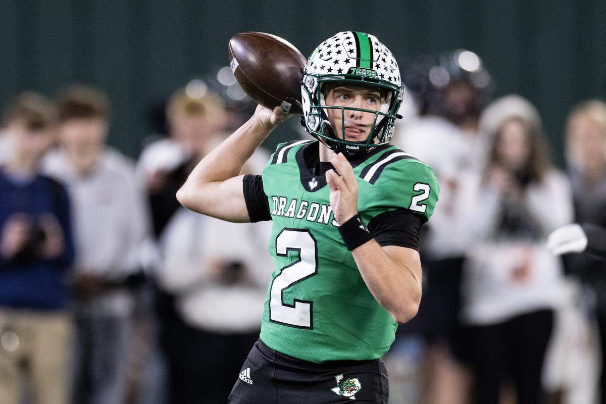 Southlake Carroll quarterback Angelo Renda (2) throws a pass in the second half of the UIL Division II Regional playoff game at Choctaw Stadium in Arlington on Friday, Nov. 28, 2025.