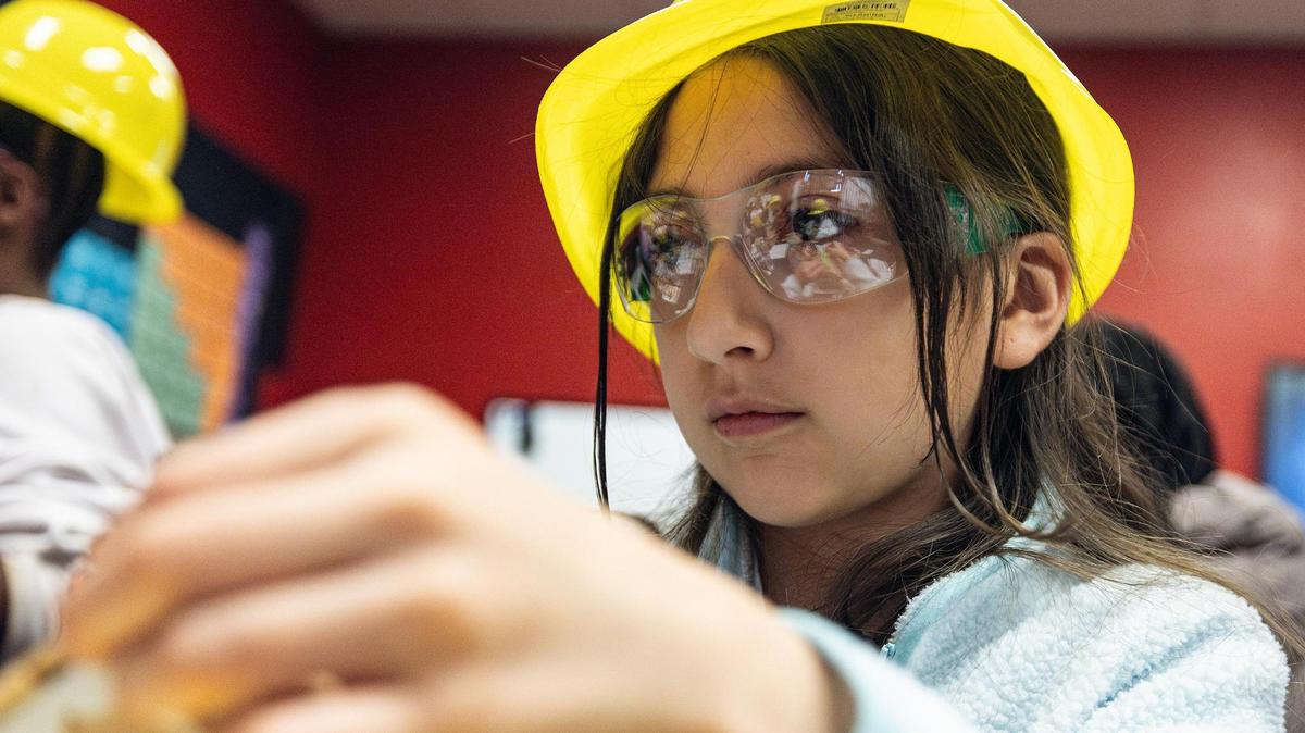 Veronica Meza, 10, builds and decorates her model house during the ‘Women in Construction’ event by Girls Inc. of Tarrant County at their headquarters in Fort Worth on Saturday, March 8, 2025.