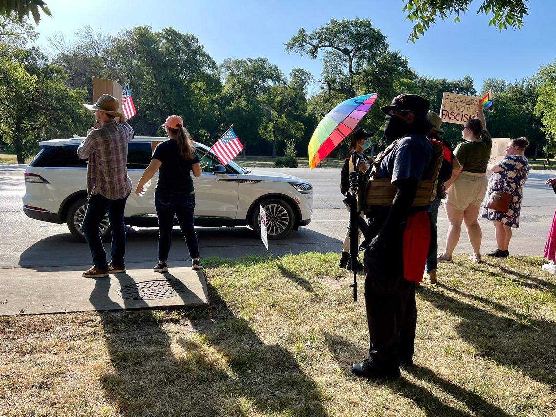 An armed protester outside the Fort Worth Botanic Garden, protesting True Texas Project’s birthday party and conference Saturday July 13, 2024