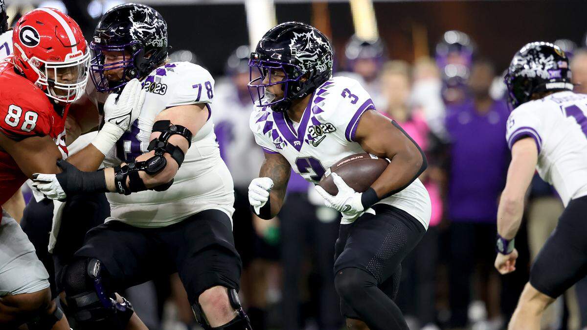 TCU running back Emari Demrcado runs the ball against Georgia at the 2023 College Football Playoff National Championship on Monday, January 9, 2023, at SoFi Stadium in Inglewood, Calif.