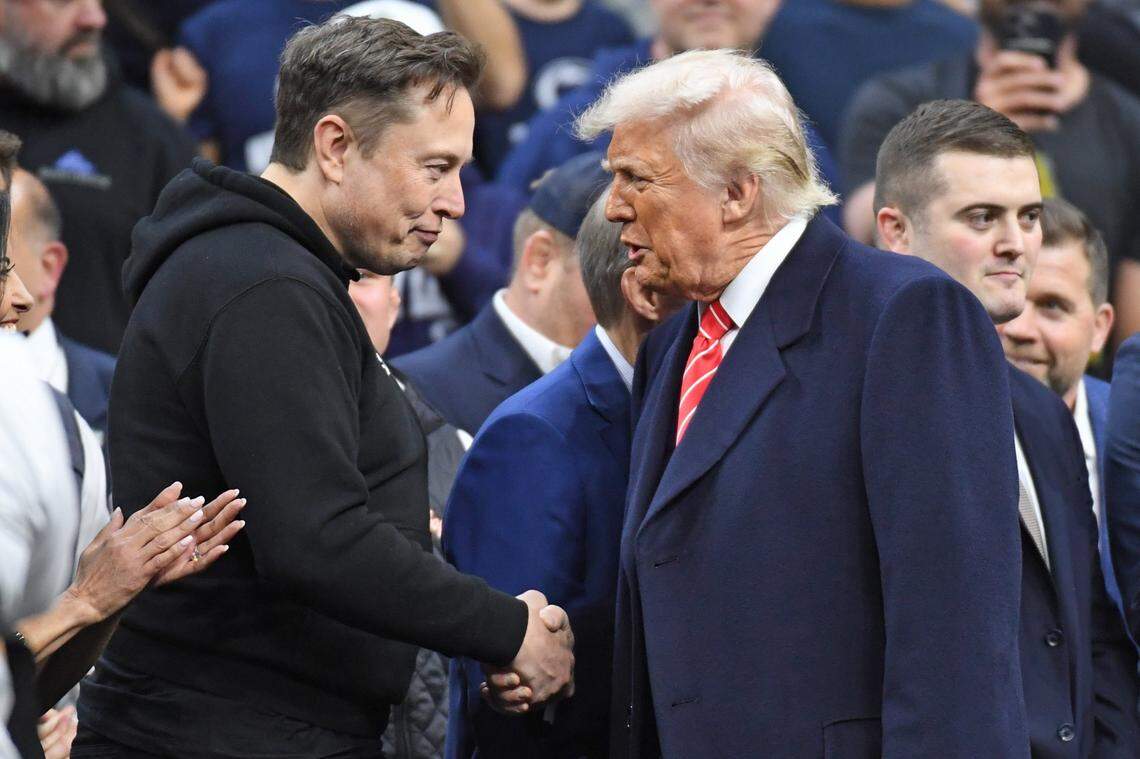 Mar 22, 2025; Philadelphia, PA, USA; Elon Musk and President Donald Trump during the Division I Men's Wrestling Championship held at Wells Fargo Center. Mandatory Credit: Eric Hartline-Imagn Images