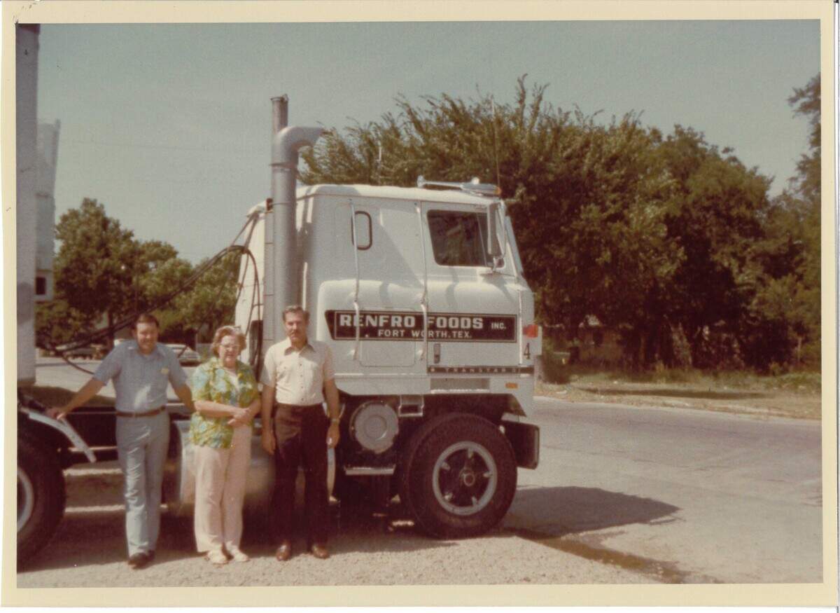 Jack Renfro (left), Arthurine Renfro (middle) and Bill Renfro (right) stand outside of a Mrs. Renfro’s big rig. Arthurine and her husband, George Renfro, started the company out of their garage in 1940.