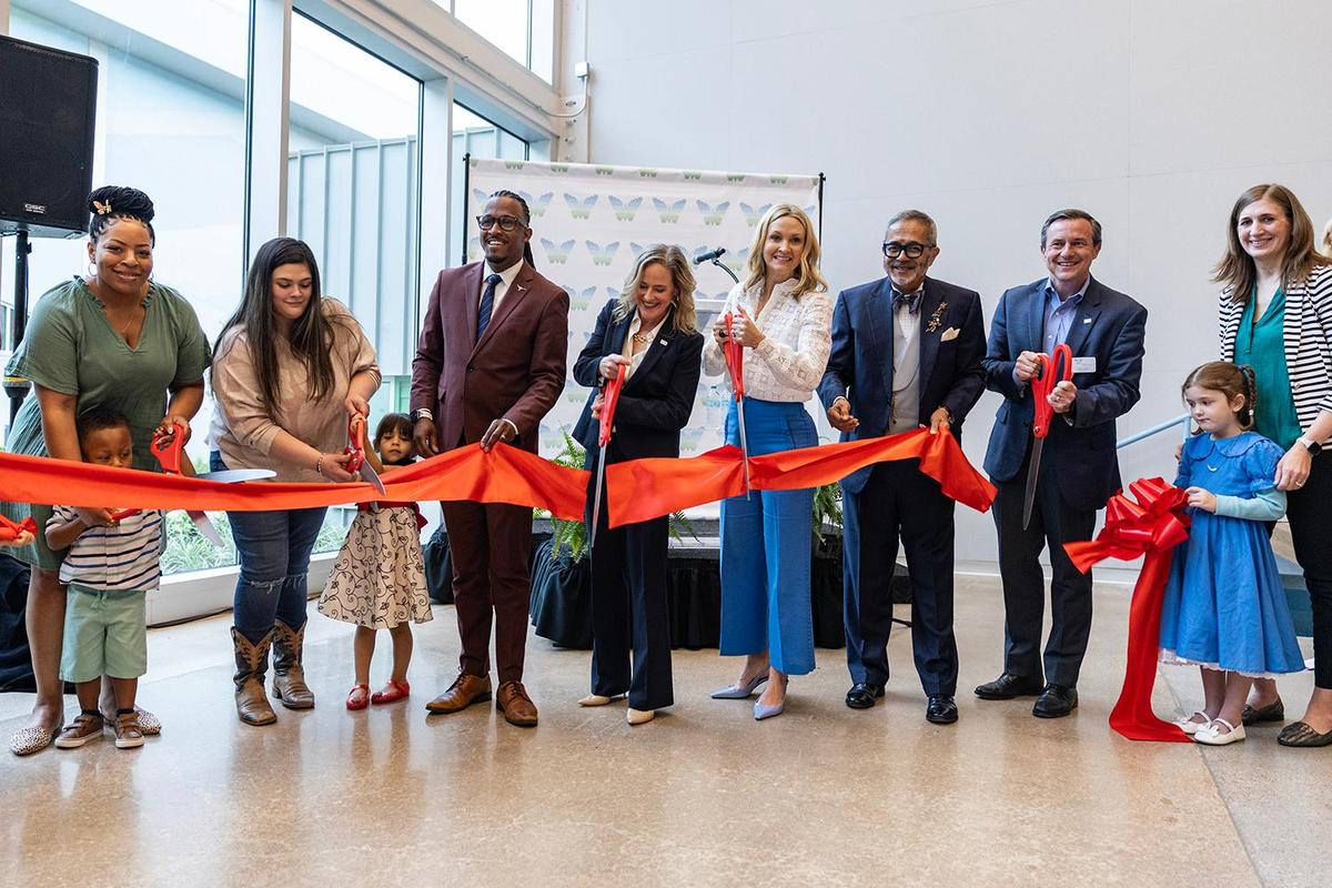 City officials and families affiliated with the Center for Transforming Lives cut the ribbon for the grand opening ceremony of the organization’s new Riverside Campus in the Morningside neighborhood of Fort Worth on Friday, May 2, 2025.
