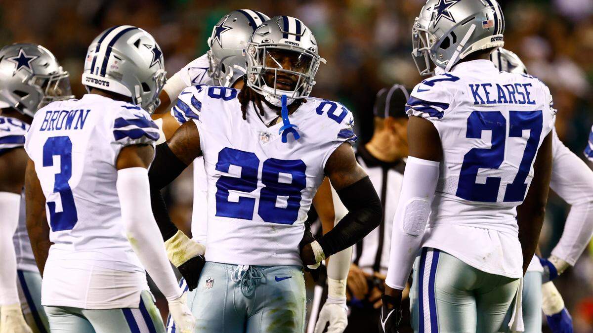 Dallas Cowboys safety Malik Hooker (28) talks with cornerback Anthony Brown (3) and safety Jayron Kearse (27) during a recent game.