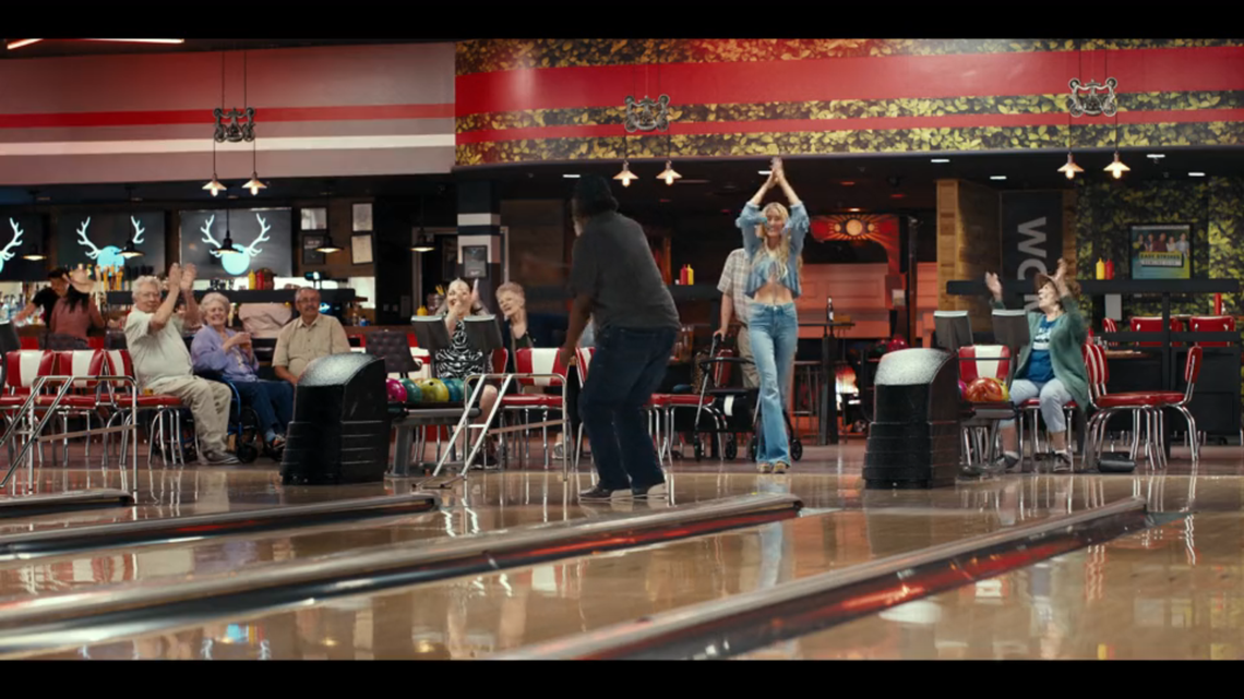 Ainsley (Michelle Randolph) bowls with nursing home residents in “Landman” episode 8.