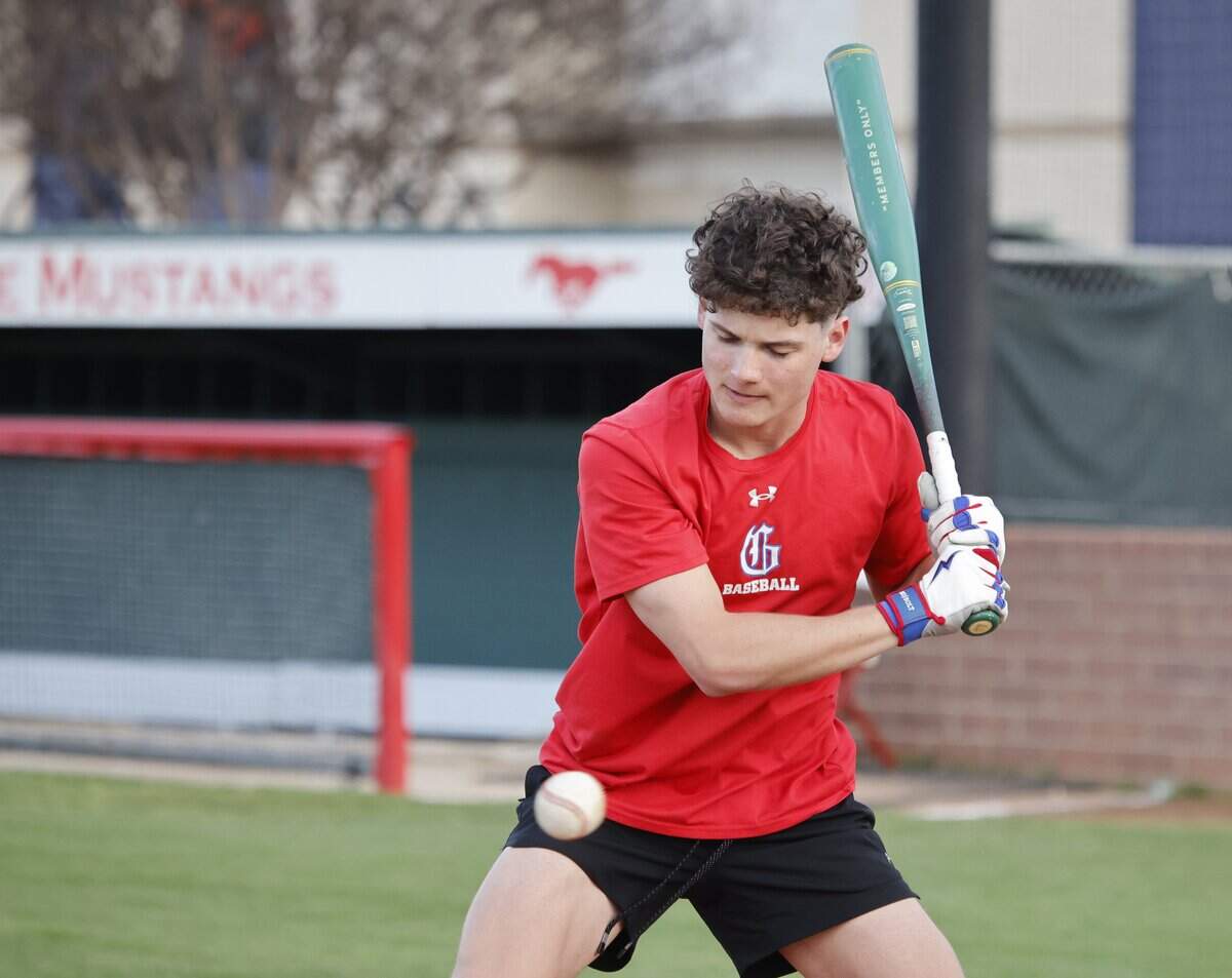 Zach Goldstein watches one go by during Grapevine Mustang baseball practice at Grapevine High School in Grapevine, Texas, Tuesday Feb. 17, 2026.
