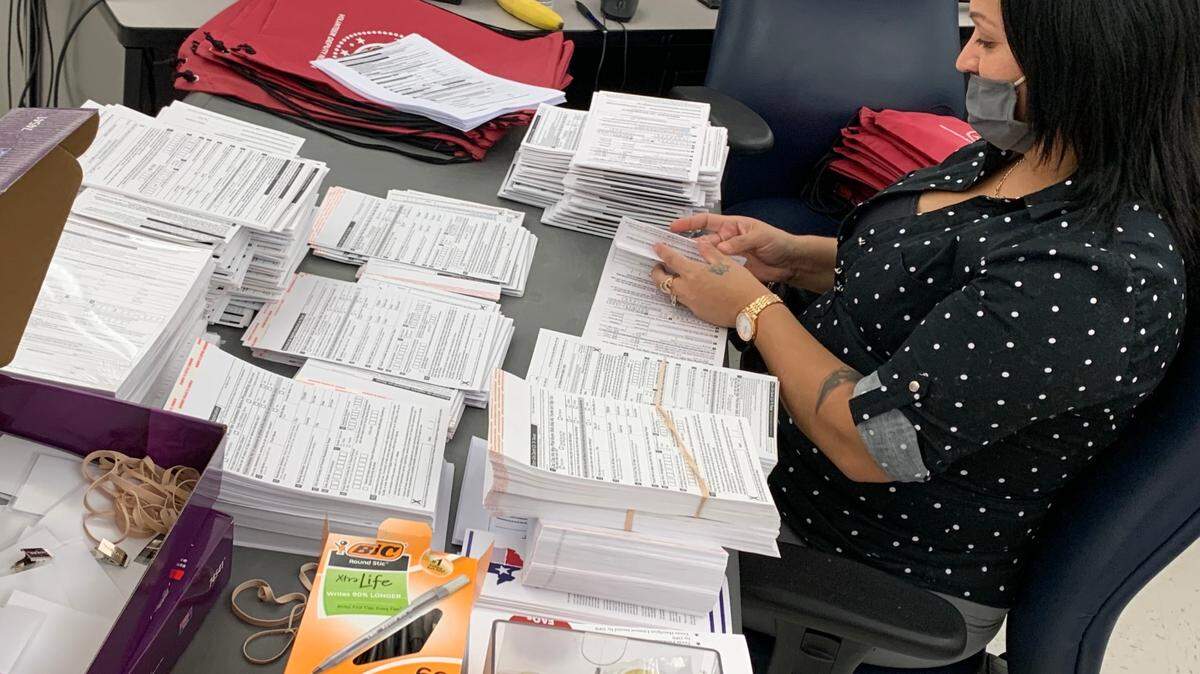 Tarrant County workers were plenty busy during the pandemic, with tasks such as processing voter registration documents.