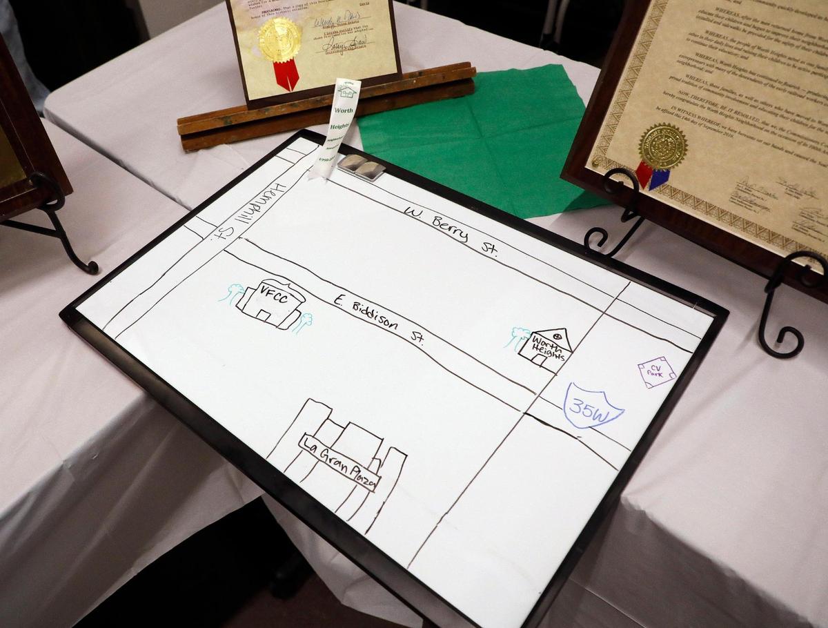 A hand-drawn map lies on a table mapping out the Worth Heights area during the Worth Heights Neighborhood Association 25th anniversary at the Victory Forest Community Center in Fort Worth on Saturday, May 20, 2023. 