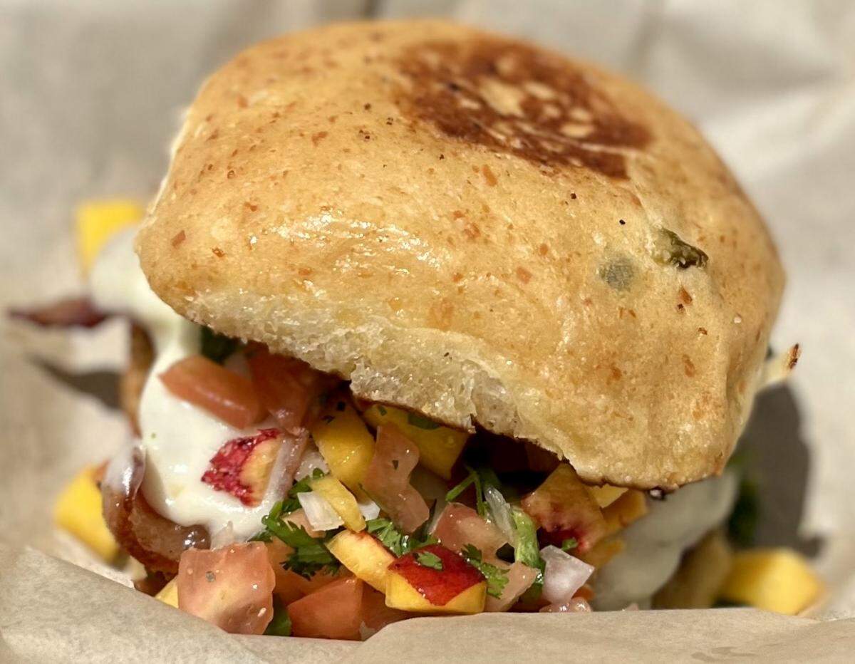 A Parker County peach pico-de-gallo burger at JD’s Hamburgers.