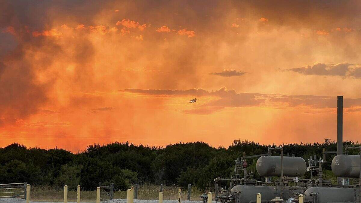 State and local authorities are battling a wildfire near Godley in Johnson County that grew to more than 1,000 acres.