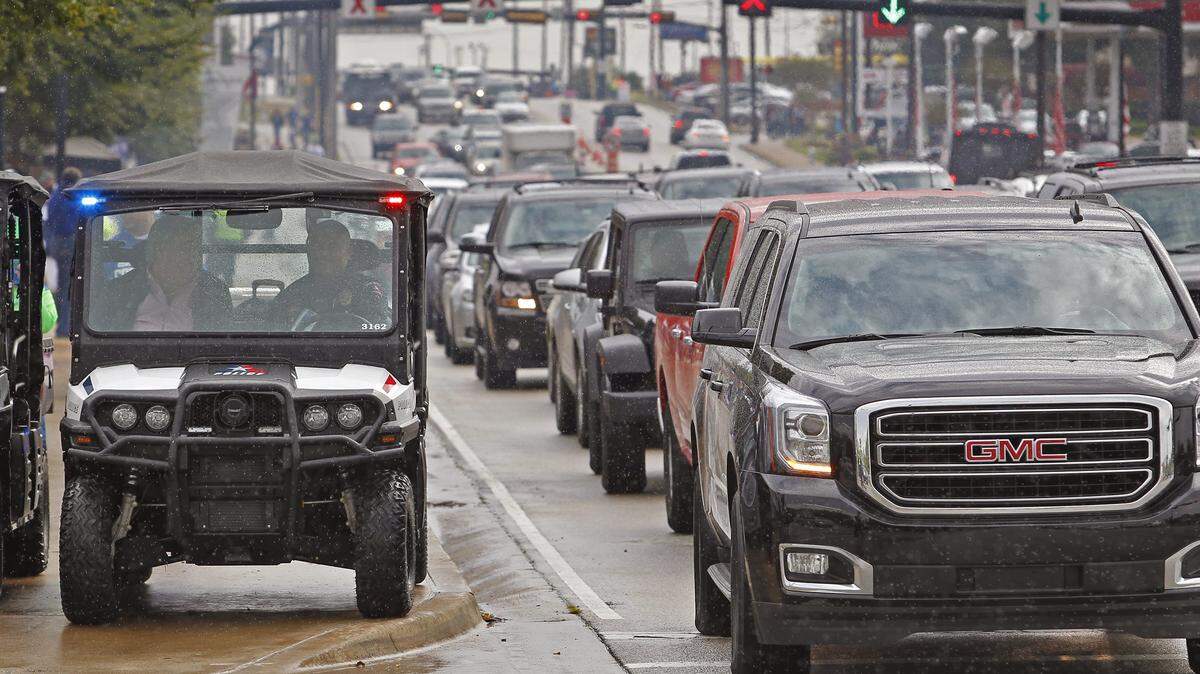 An Arlington police vehicle on Collins, game traffic bumper-to-bumper before the game. The Arlington Police lead the multi-layered security efforts at AT&T Stadium in Arlington, Texas in 2015, before the Dallas Cowboys play the Seattle Seahawks.
