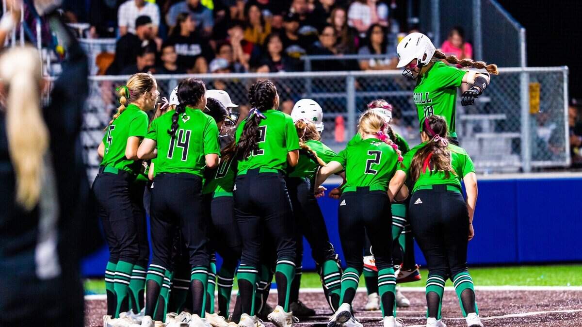 The Southlake Carroll Dragons celebrate at home plate after junior Lillian Cooper hit a three run homer to help the team beat Abilene Friday, May 14, 2021 at Weatherford HS (Matt Smith/Special to the Star Telegram)