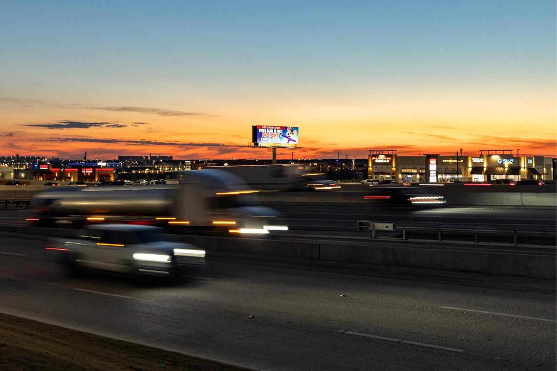 Cars exit the freeway past the Alliance Town Center at I-35W in Alliance on Wednesday, Jan. 15, 2025.