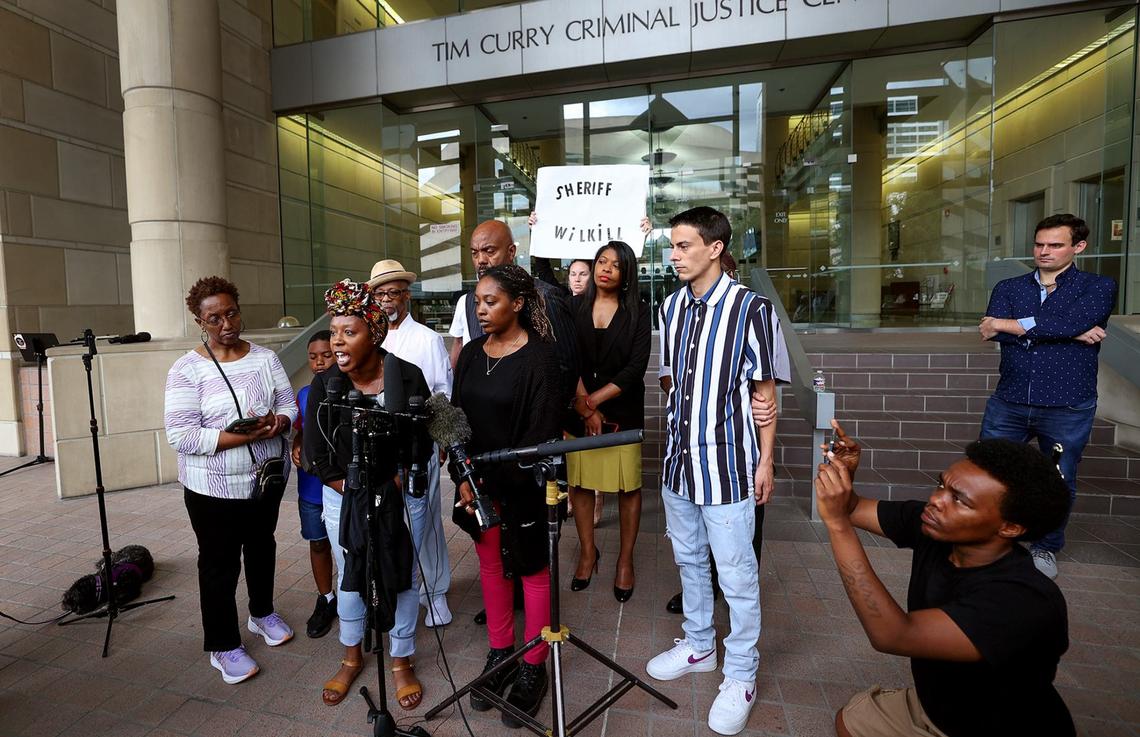 The family of Anthony Johnson Jr. gathers for a press conference outside of the Tim Curry Criminal Justice Center on Tuesday, after his death at the the Tarrant County jail was ruled a homicide by asphyxiation.