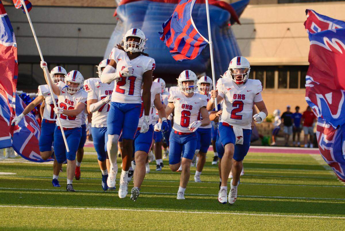 The Grapevine Mustangs take the field against Everman in a District 3-5A D2 game on Friday, September 12, 2025 at Marr Stadium in Everman, Texas.