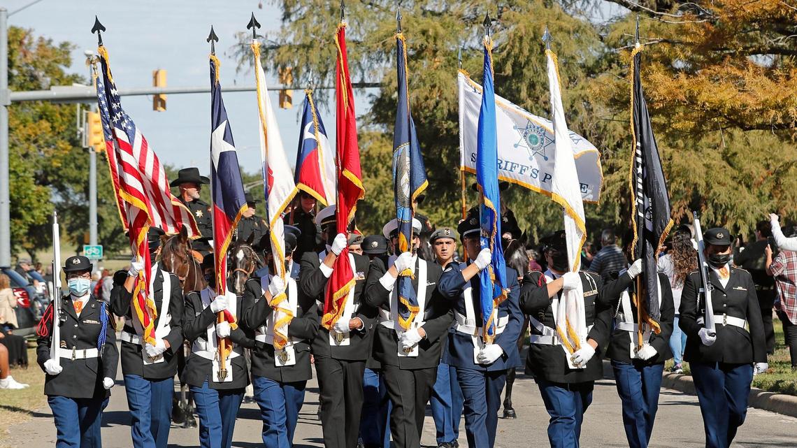 United States, Texas and military flags led the Veterans Day Parade in Fort Worth, Texas, Thursday Nov. 11, 2021. (Special to the Star-Telegram Bob Booth)