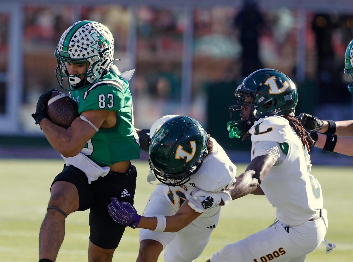 Southlake Carroll running back Christian Glenn (83) escapes the Longview defense for a long gain during the UIL 6A D2 Semifinals football game at Gerald J. Ford Stadium in University Park, Texas, Saturday, Dec. 14, 2024.