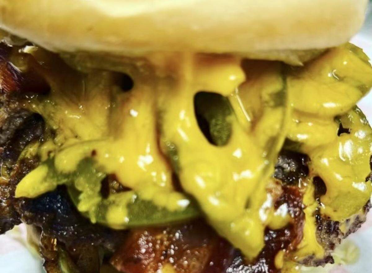 A cheesy Hooker’s Grill burger.
