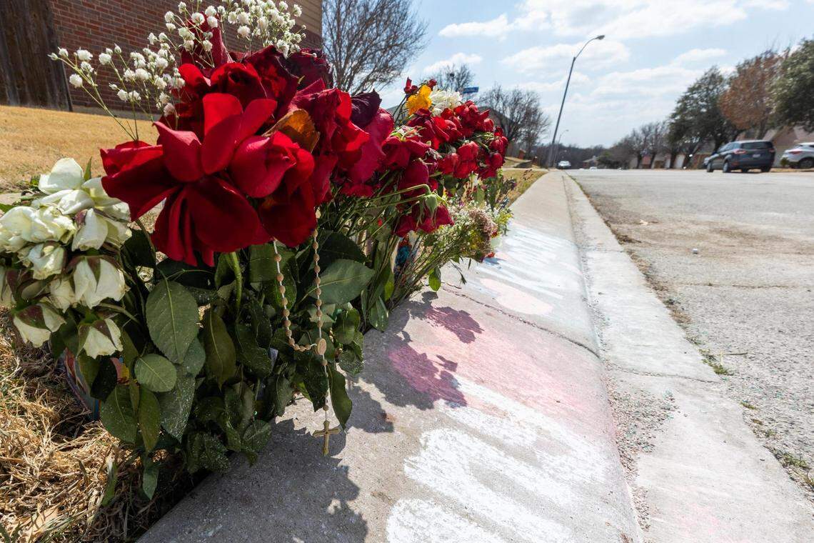 The memorial on a residential street in Watauga.