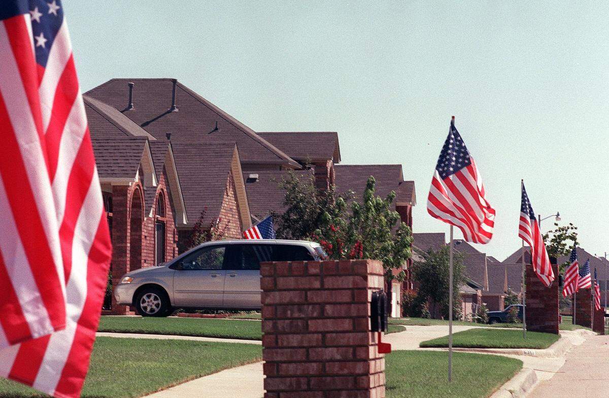 Fannin Farm neighborhood lined with flags in South Arlington on Sept. 12, 2001.