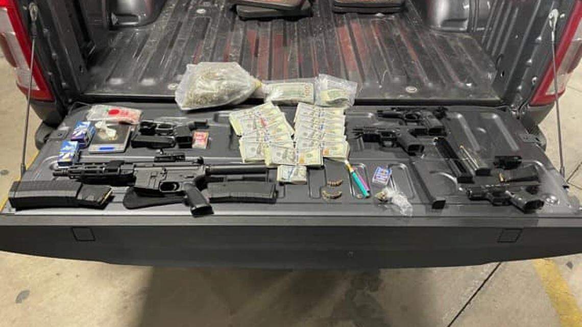The Bexar County Sheriff’s Office says a 17-year-old driver and a 21-year-old passenger were arrested after the teen posed with drugs, guns and cash in a photo. Deputies seized handguns, a pistol, drugs and $15,000.