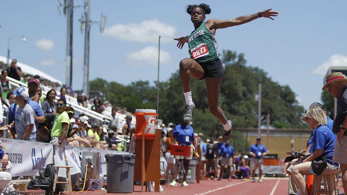 Mansfield Lake Ridge junior Jasmine Moore, shown at last year’s UIL state track and field meet, defended her Class 5A state titles in the long jump and triple jump Friday in Austin.