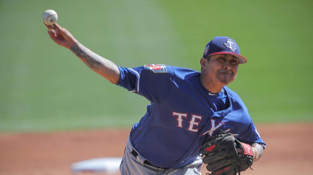 Texas Rangers pitcher Jesse Chavez (53) pitches as the Texas Rangers play the Los Angeles Dodger at in Glendale, Arizona in spring training, Tuesday, February 27, 2018.