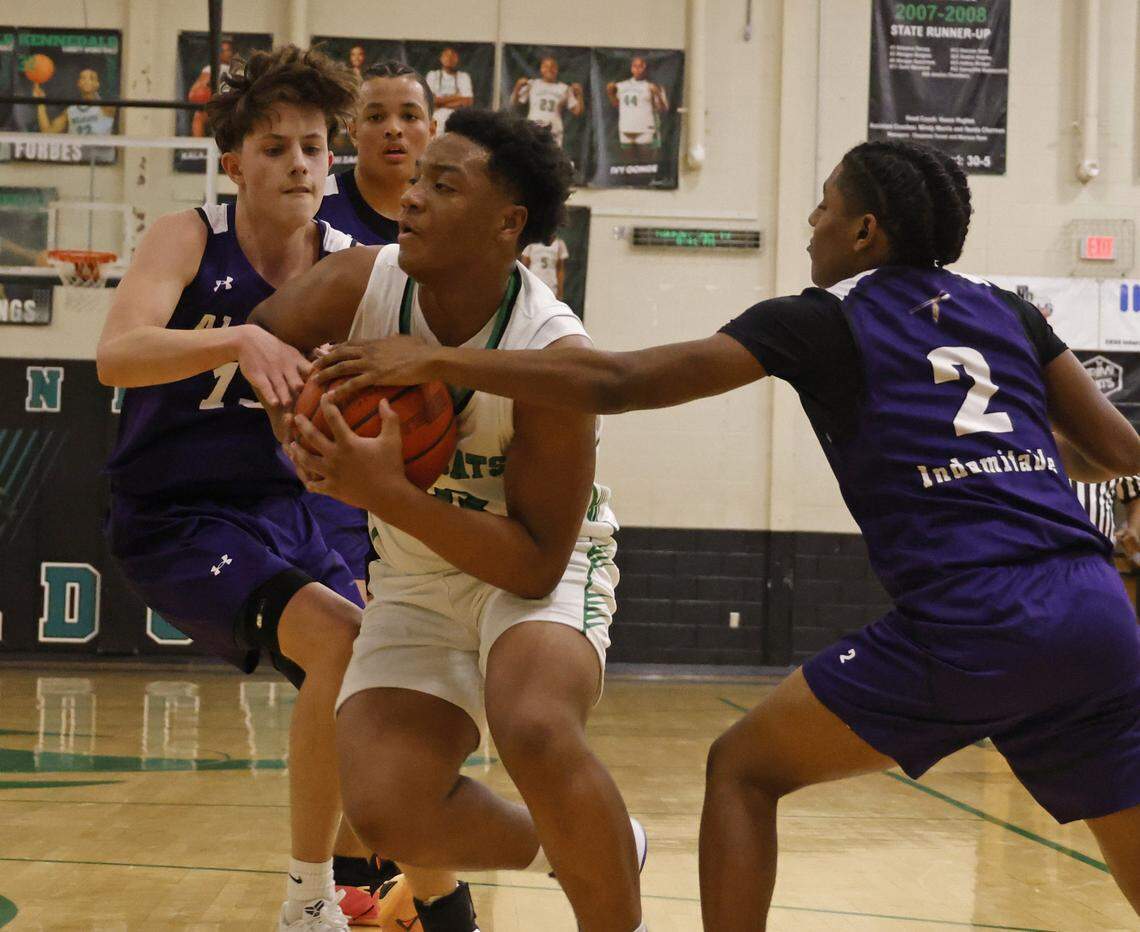 Kennedale shooting guard Kingston Jamerson (52) drives through traffic for two during the first half of a UIL boys basketball game between Alvarado and Kennedale at Kennedale High School in Kennedale, Texas, Tuesday Jan. 13, 2026