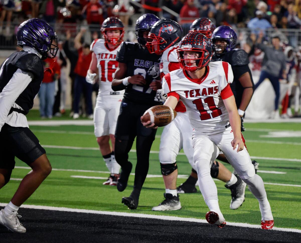 Northwest quarterback Ryder Norton (11) scores their only touchdown of the first half of a UIL Class 6A D2 Bi-district playoff football game at Crowley ISD Multi-Purpose Stadium in Fort Worth, Texas, Friday, Nov. 15, 2024.