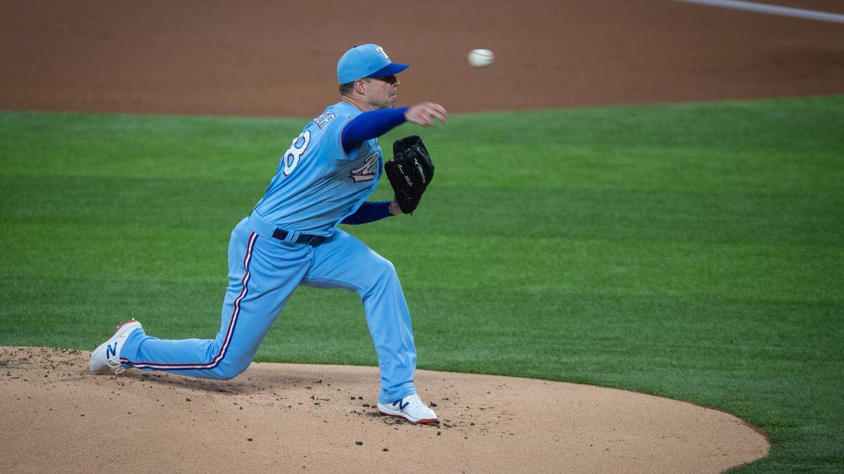 Texas Rangers Corey Kluber pitches in the first inning during the game against the Colorado Rockies Sunday, July 26, 2020, at Globe Life Field.