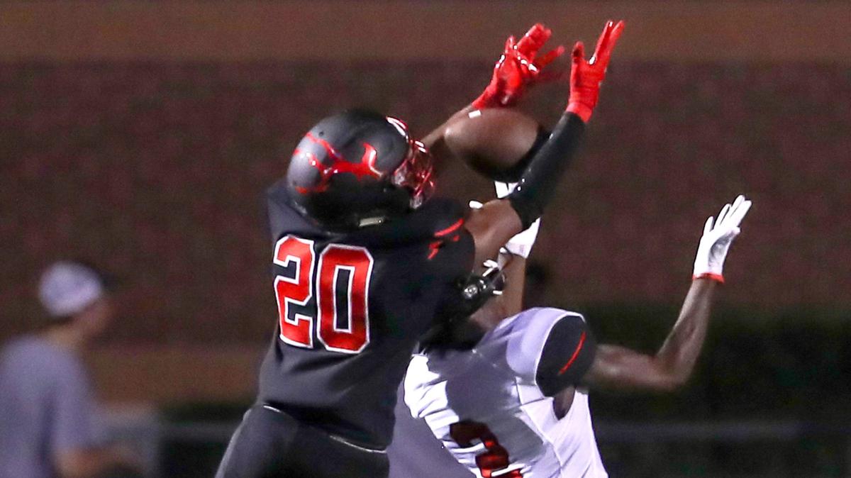 Burleson cornerback Tre Allison (20) defends a pass intended for Denton Braswell wide receiver JK Carter (2) during the first half, Friday night, September 6, 2019 played at Burleson ISD Stadium in Burleson, TX.