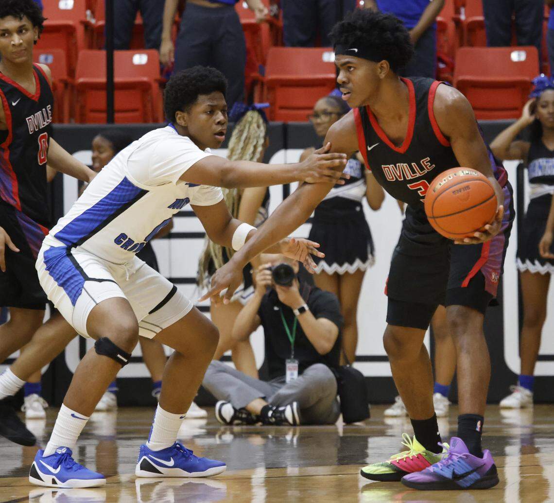 North Crowley wing Bennjamin Jones (0) defends against Duncanville guard Jirehn Mitchell (3) during the first half of a UIL Class 6A Division I boys semifinal basketball game at Wilkerson Greines Activity Center in Fort Worth, Texas, Monday, Mar. 10, 2026.