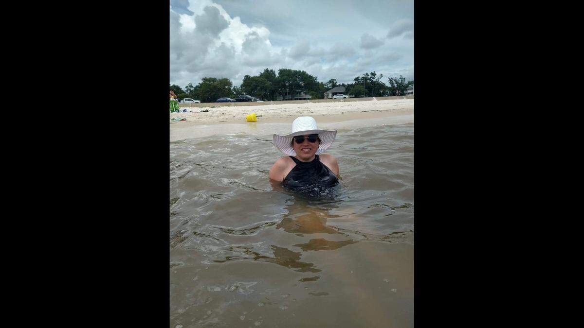 Kelly Masten fell in love with seashells and sand castles on her first trip to the beach, her sister says.