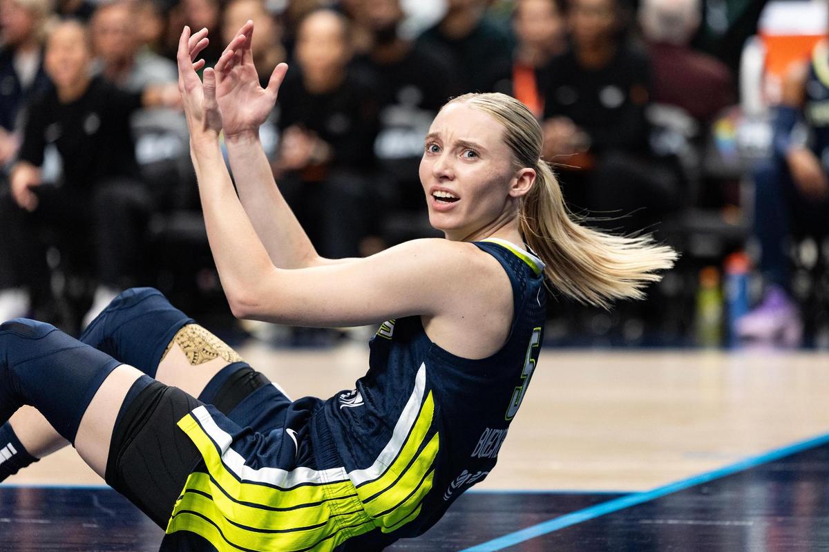 Dallas Wings guard Paige Bueckers (5) reacts after a no-foul call during the first half of a WNBA game between the Dallas Wings and Indiana Fever at the American Airlines Center in Dallas on Friday, June 27, 2025.