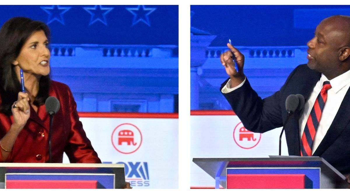 Former South Carolina Gov. Nikki Haley, left, and South Carolina Sen. Tim Scott argue during the FOX Business Republican presidential primary debate at the Ronald Reagan Presidential Library and Museum in Simi Valley, California, on Sept. 27.