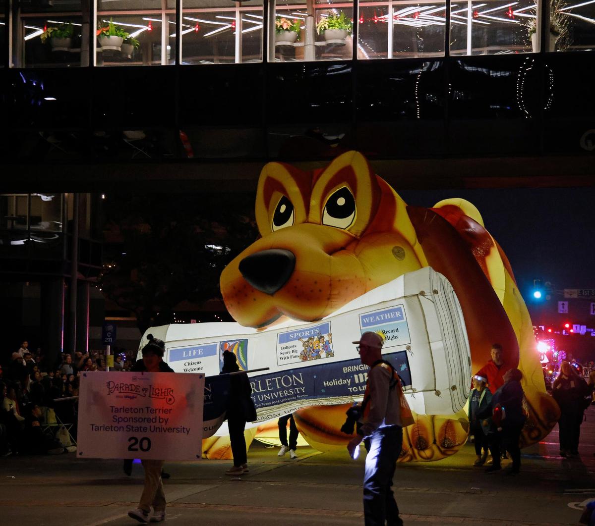 Tarleton State’s float barely cleared an overhead walkway on Commerce Street.