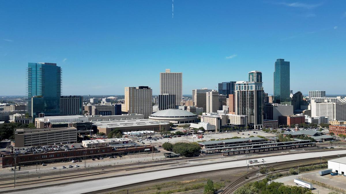 Downtown Fort Worth on Friday, Oct. 18, 2024. The parking lot on the far right across from the Fort Worth Central Station are slated as a site for a future 12-story, 408-apartment complex by Miami-based developer Resia.