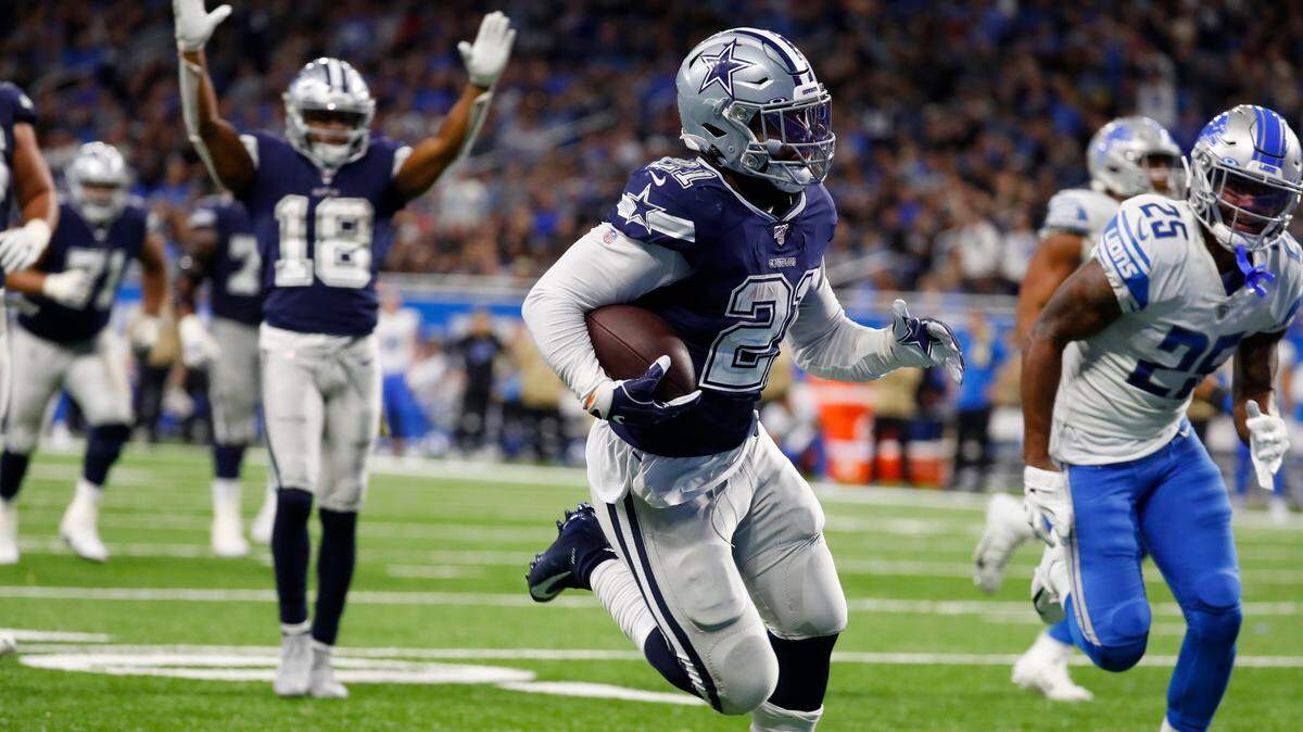 Dallas Cowboys running back Ezekiel Elliott runs into the end zone for a touchdown during the second half of Sunday’s victory over the Detroit Lions. Elliott scored twice Sunday but struggled in the run game, picking up only 45 yards on 16 carries.