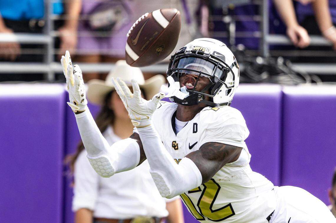 Colorado wide receiver Travis Hunter (12) dives for a catch during a college football game between the TCU Horned Frogs and the Colorado Buffaloes at Amon G. Carter Stadium in Fort Worth on Saturday, Sept. 2, 2023.