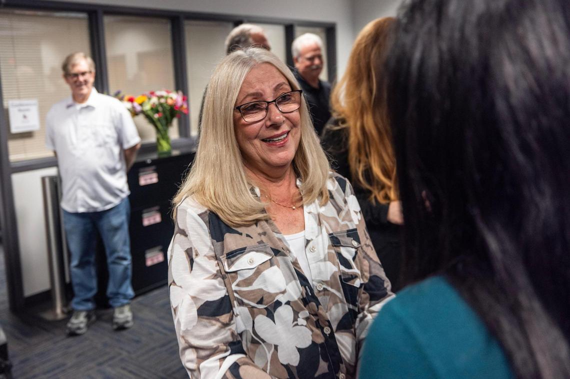 Kelly Chance, a friend of Megan Johns, becomes emotional speaking to the news media gathered for a news conference announcing an arrest in the 1994 murder of Megan Johns at the Irving Police Department on Wednesday, June 11, 2025.