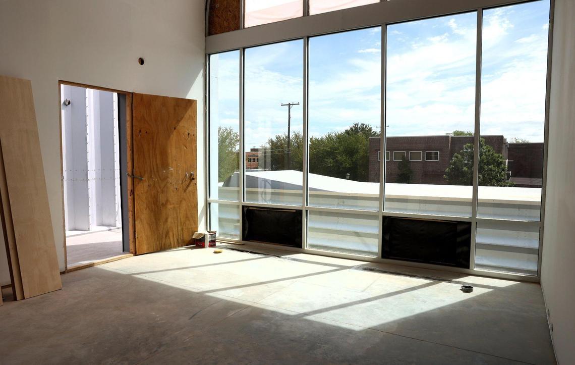 Apartments at PS1200 feature large windows overlooking the property.