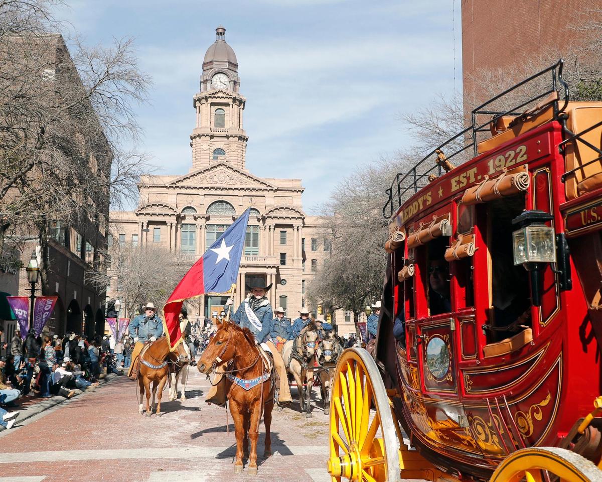 Coaches and riders made their way down Main Street during the 2023 Fort Worth Stock Show and Rodeo parade in downtown Fort Worth.