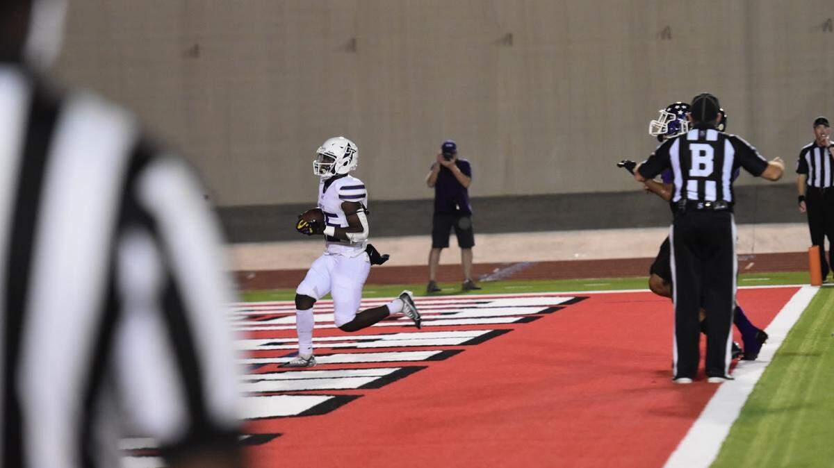 Chisholm Trail’s Israel Kaloso (25) runs the ball for his second touchdown of the night during the high school football game against Paschal at Farrington Field in Fort Worth, Texas, Friday, Oct. 21, 2022. Chisholm Trail won 34-0. (Caleb Luttrell/Special to the Star-Telegram)