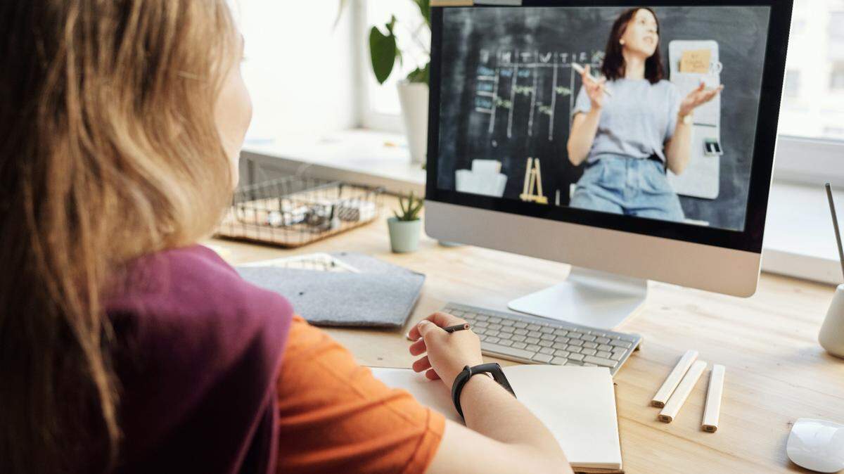 To make the hybrid system work, the Dallas school had to make sure that all students had access to the technology they needed to learn. PHOTO ILLUSTRATION