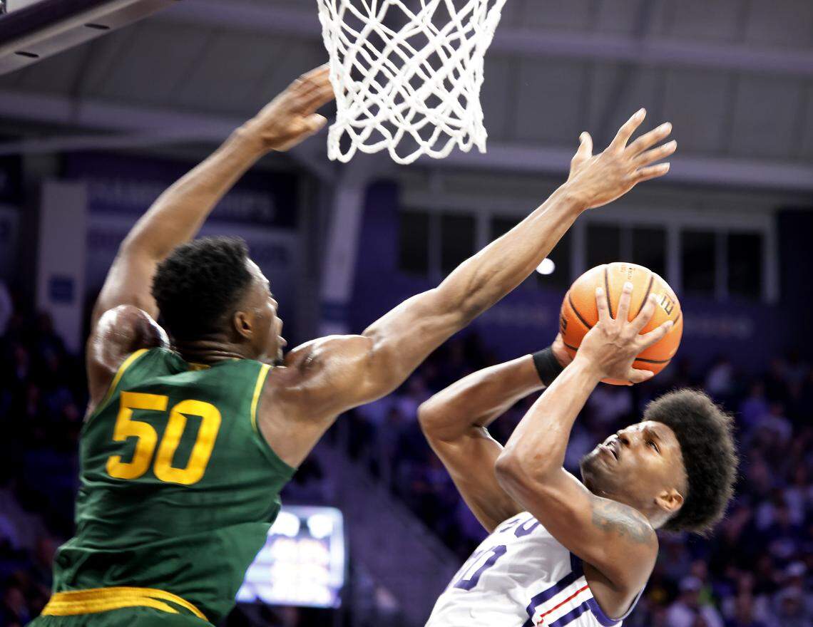 TCU guard Jace Posey (00) shoots against Baylor center James Nnaji (50) during the second half of a NCAA basketball game between Baylor University and TCU at Schollmaier Arena in Fort Worth, Texas, Saturday Jan. 03, 2026