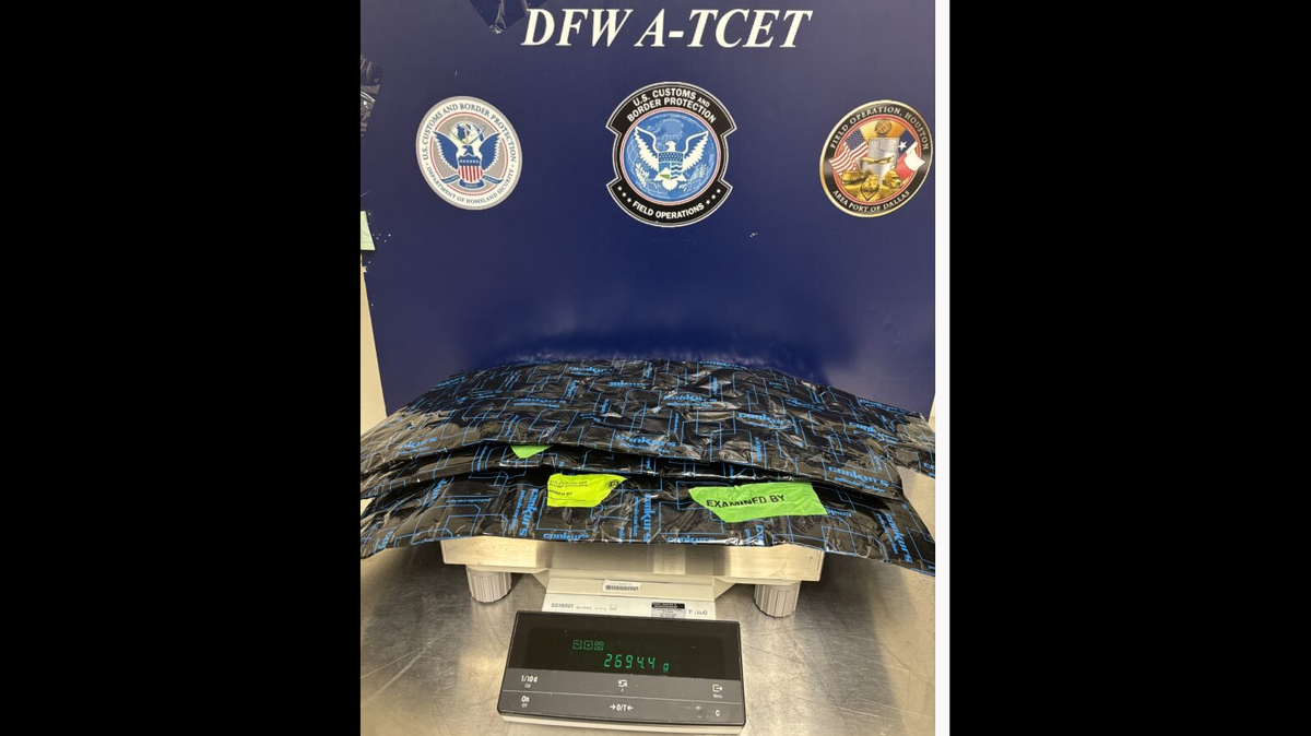 Packages of cocaine seized from passenger luggage at DFW International Airport on Monday.