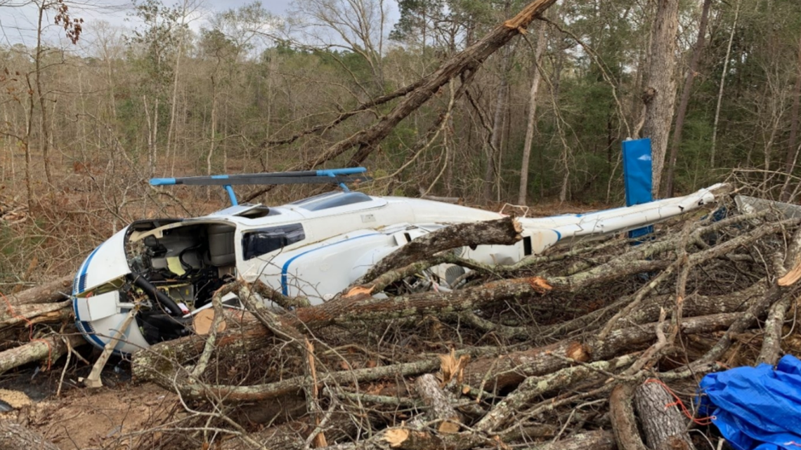 The helicopter was on its side after it crashed near Livingston, Texas. Officials say one passenger was killed, the pilot was seriously injured, and two other passengers had minor injuries.