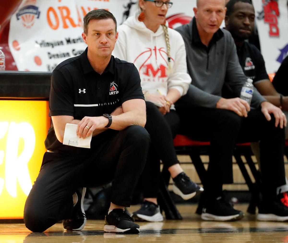 Arlington Martin head coach John Osborn watches action in the first half of the Orange division of the Whataburger Tournament basketball championship game at Mansfield Legacy high school in Mansfield, Texas, Friday, Dec. 30, 2022. Ellison led by two at the half. (Special to the Star-Telegram Bob Booth)